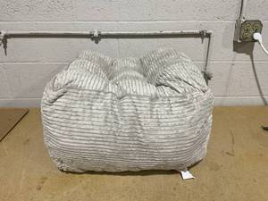 lot 174 image: HIGOGOGO Square Stuffed Pouf Ottoman, Corduroy Poufs with Foam Chunk Filling, Furry and Fluffy Pouf Foot Stool Storage Ottoman, 21 X 21 X 13 Floor Poufs Foot Rest for Living Room, Beige