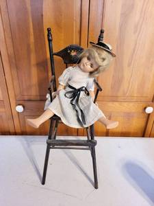 lot 58K image: Vintage Composition Doll with Dress & Hat in Painted Wooden Doll Chair