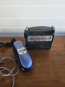 lot 124B image: GE Caller ID Phone and General Electric Vintage Portable AMFM Radio Lot