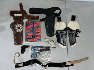 lot 25B image: Vintage Toy Cap Guns, Holsters, Cap Rolls, and Ocarina Toy Collection