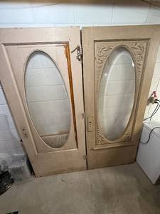 lot 4 image: Pair of Antique Glass Panel Wood Doors with Hand Carved Trim and Hardware