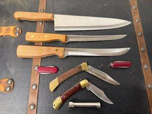 lot 99B image: Knife Collection Including Folding Pocket Knives, Swiss Army Knives, and Wooden Handle Kitchen Knives