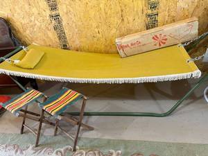 lot 115 image: Vintage Verona Net Co. Hammock with Yellow Canvas, Stand, and 2 Folding Stools