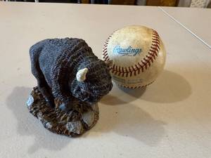 lot 116 image: Buffalo Figurine and Rawlings Official League Baseball