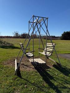 lot 221 image: Outdoor Metal and Wood Glider Swing Seats Four