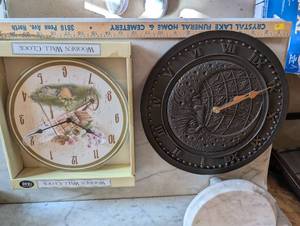 lot 28 image: Set of 2 Wall Clocks - Decorative Metal and Wooden Garden Theme
