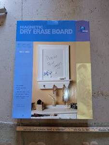 lot 31 image: Magnetic Dry Erase Board with Decorative Hooks, 25.5 x 31 Inches, White Finish