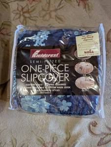 lot 51 image: Fadedcrest Semi-Fitted One-Piece Sofa Slipcover, Floral Pattern, Fits 78-96