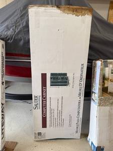 lot 182 image: Sauder Woodworking Computer Cabinet in Woodland Oak Finish