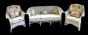 lot 41RR image: P - Vintage White Wicker Sofa with Two Rocking Chairs and Floral Cushions