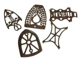 lot 333R image: FR - Collection of 5 Vintage Cast Iron Trivets in Assorted Designs