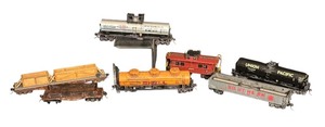 lot 483R image: Collection of 7 Vintage Model Train Cars Assorted Rail Lines