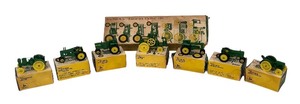 lot 496R image: LL - Set of 7 Vintage John Deere Miniature Tractor Toys