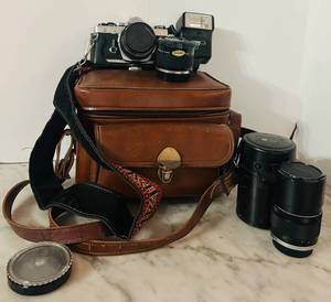 lot 120C image: LR - Olympus OM-1 35mm SLR Camera Set with Lenses, Flash, and Leather Case