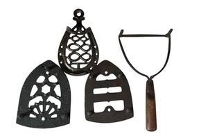 lot 216C image: LR - Set of 4 Antique Cast Iron Sad Iron Trivets
