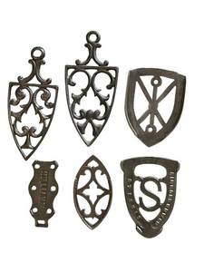 lot 416C image: LR - Set of 6 Antique Cast Iron Sad Iron Trivets Assorted Designs