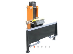 lot 53 image: Wolverine Skid Steer Post Driver