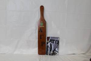 lot 380 image: Alpha Gamma Rho Fraternity Wooden Paddle and Alpha Tau Omega 1996-97 Booklet