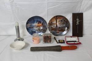 lot 384 image: Assorted Collectibles and Decor Lot Including Bradford Exchange Plates, Coin Banks, and Cross Plaque