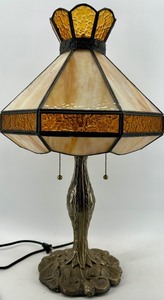lot 96 image: Tiffany-Style Table Lamp with Amber Glass Shade on Bronze Base