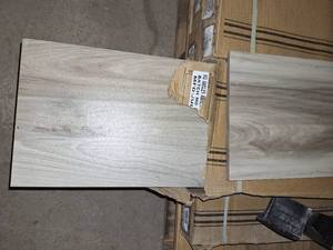 lot 17 image: 6 boxes ansley amber 8x40 porcelain tile