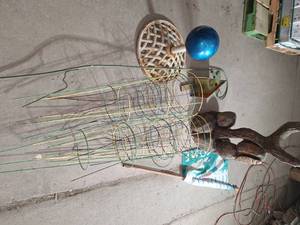lot 49 image: Yard decor and tomato cages