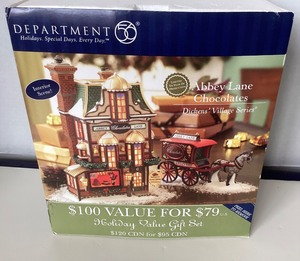 lot 20 image: Dept 56 Dickens Village Abbey Lane Chocolates  Delivering Holiday Chocolates