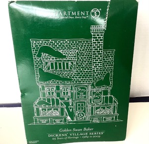lot 85 image: Dept 56 Dickens Village Series (25 Yr) Golden Swan Baker