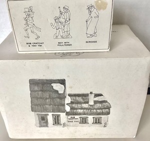 lot 153 image: Dept 56 Dickens Village Series The Cottage of Bob Cratchit and Tiny Tim  Christmas Carol Characters