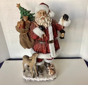 lot 189 image: 19 Fabric Mache Santa Claus