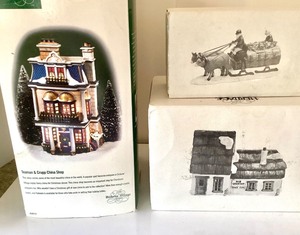lot 44 image: Dept 56 Dickens Village  Teaman & Crupp China Shop   The Cottage of Bob Cratchit and Tiny Tim   Ox Cart
