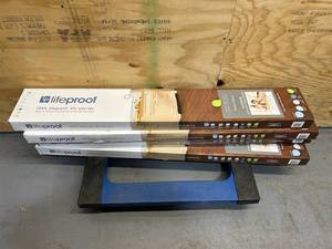 lot 17 image: Lifeproof Shadow Hickory 6 MIL x 7.1 in. W x 48 in. L Click Lock Waterproof Luxury Vinyl Plank Flooring (18.73 sqftcase) (lot of 4)
