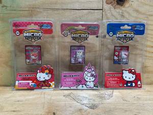 lot 26 image: Worlds Smallest Micro Figures Hello Kitty - (lot of 3)