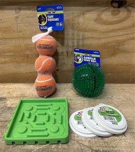 lot 103 image: Dog toys and feeder