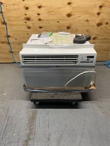 lot 144 image: LG 10,000 BTU 115V Window Air Conditioner LW1016ER with Remote in White