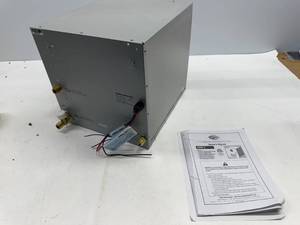lot 192 image: GIRARD LP GAS TANKLESS WATER HEATER. MISSING PANEL.