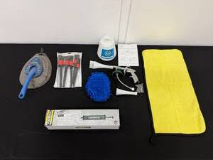 lot 6 image: Automotive Detailing Tool Lot with Cleaning Gun, Brushes, Suction Gun, and Accessories