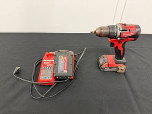 lot 12 image: Milwaukee M18 12 Brushless DrillDriver with Battery and Charger
