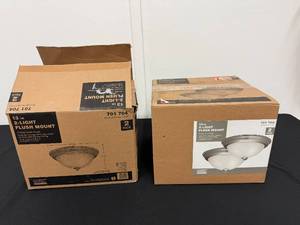 lot 40 image: Lot of 2 Two-Packs 13 in 2-Light Flush Mount Ceiling Fixtures with Frosted Glass