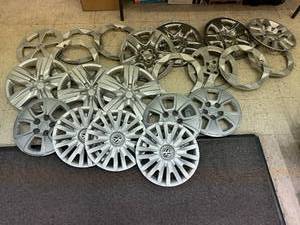 lot 44 image: Collection of Assorted Plastic Hubcaps and Wheel Covers