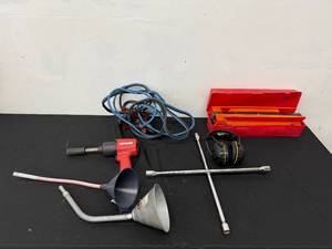 lot 47 image: Automotive Tool and Accessory Lot with Impact Wrench, Jump Cables, Lug Wrench, and Funnels