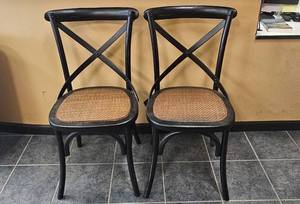 lot 131 image: Pair of Safavieh AMH9500B Black Dining Chairs with Woven Seats