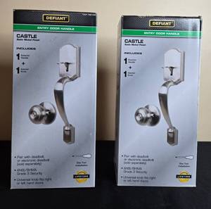 lot 137 image: 2 Defiant Castle Satin Nickel Entry Door Handle Sets in Orig Pkg