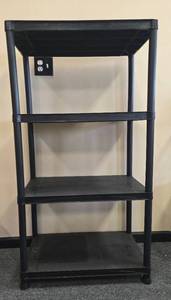 lot 143 image: Black 4-Shelf Plastic Storage Rack 53 x 28 x 15 Inches