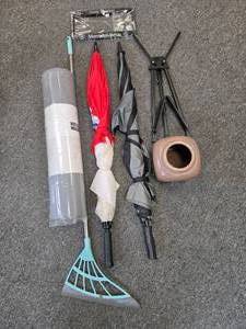 lot 160 image: Mixed Household and Outdoor Lot with Yoga Mat, Rake, Umbrellas, Plant Pot, and Mercedes-Benz License Frame