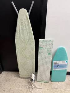 lot 205 image: Ironing Board, Iron, Countertop Ironing Board, and Simplicity Pattern Cutting Board Set