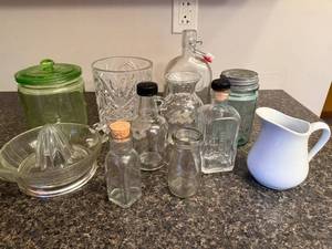 lot 36 image: Collection of Vintage Glass Jars, Bottles, Juicer, and White Pitcher