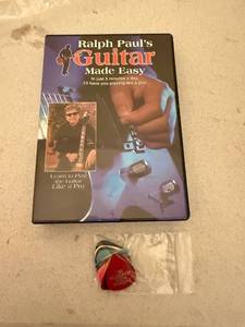 lot 64 image: Ralph Pauls Guitar Made Easy DVD with Guitar Picks Set