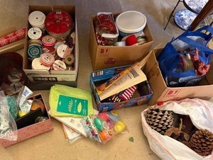 lot 69 image: Holiday and Craft Supplies Collection with Ribbons, Wrapping Paper, Pinecones