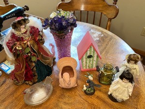 lot 11 image: Assorted Collectibles Porcelain Dolls, Glass Hen Dish, Birdhouse, and Decorative Figurines